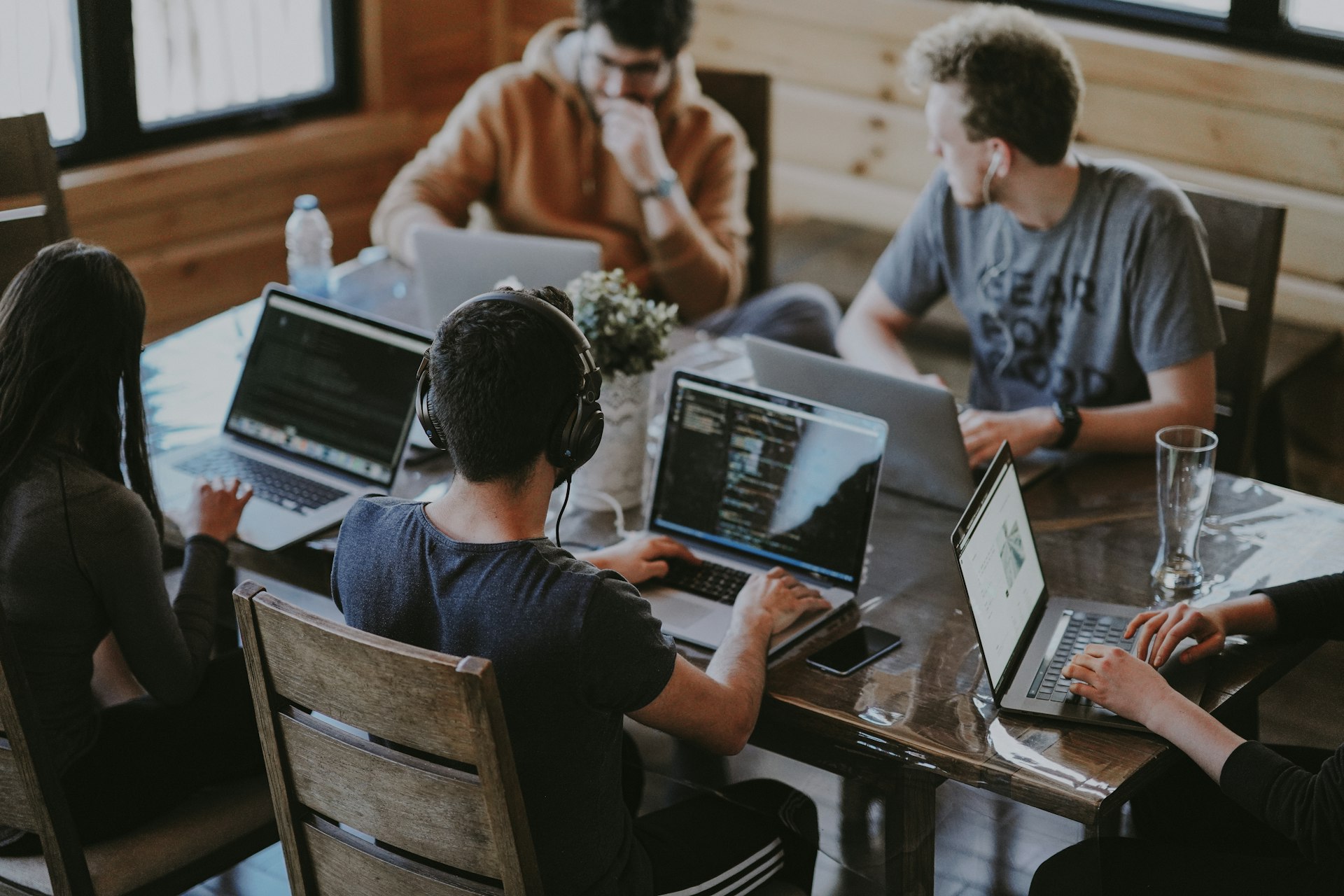 The Tends to Infinity engineering team collaborating in their Dhaka office